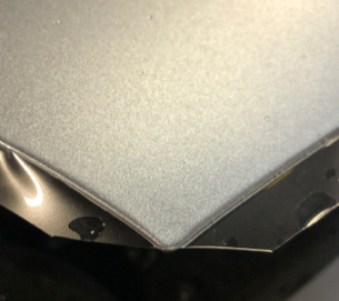 A protective film is applied to a silver vehicle A protective film is applied to a silver vehicle